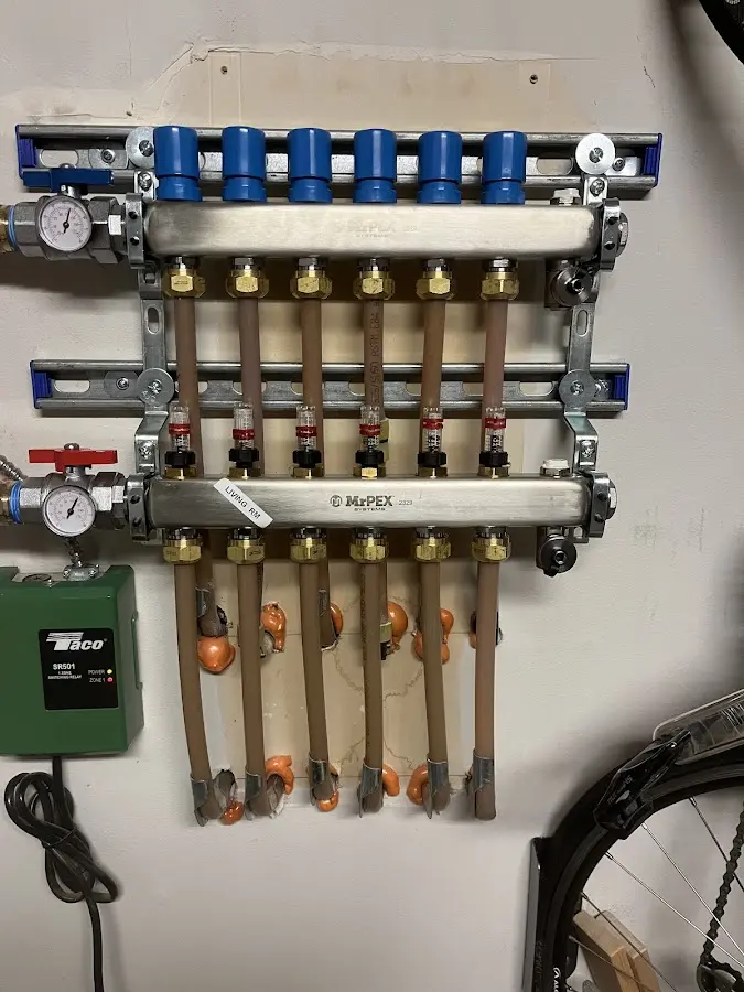 Plumber performing Leak Detection at a residential property in Bethel